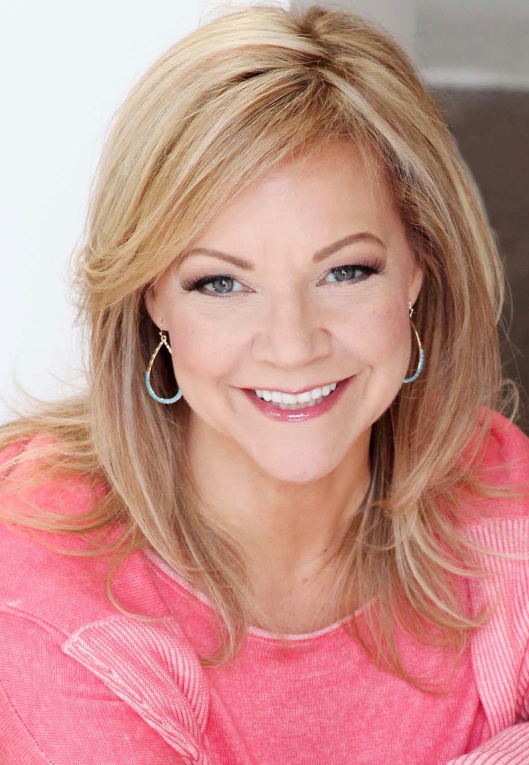 Rhonda Britten Pink Headshot (1)-min